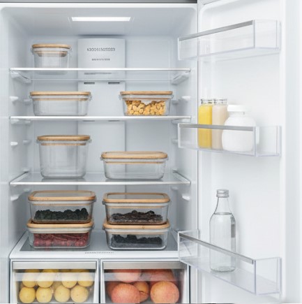 Applying baking soda paste to remove stubborn fridge odors